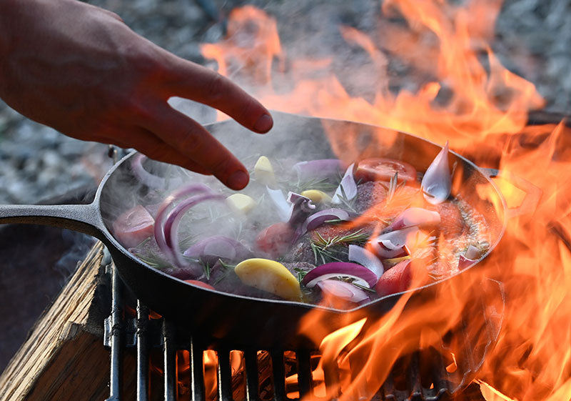 Cooking Over Fire with Cast Iron: The Ultimate Outdoor Guide